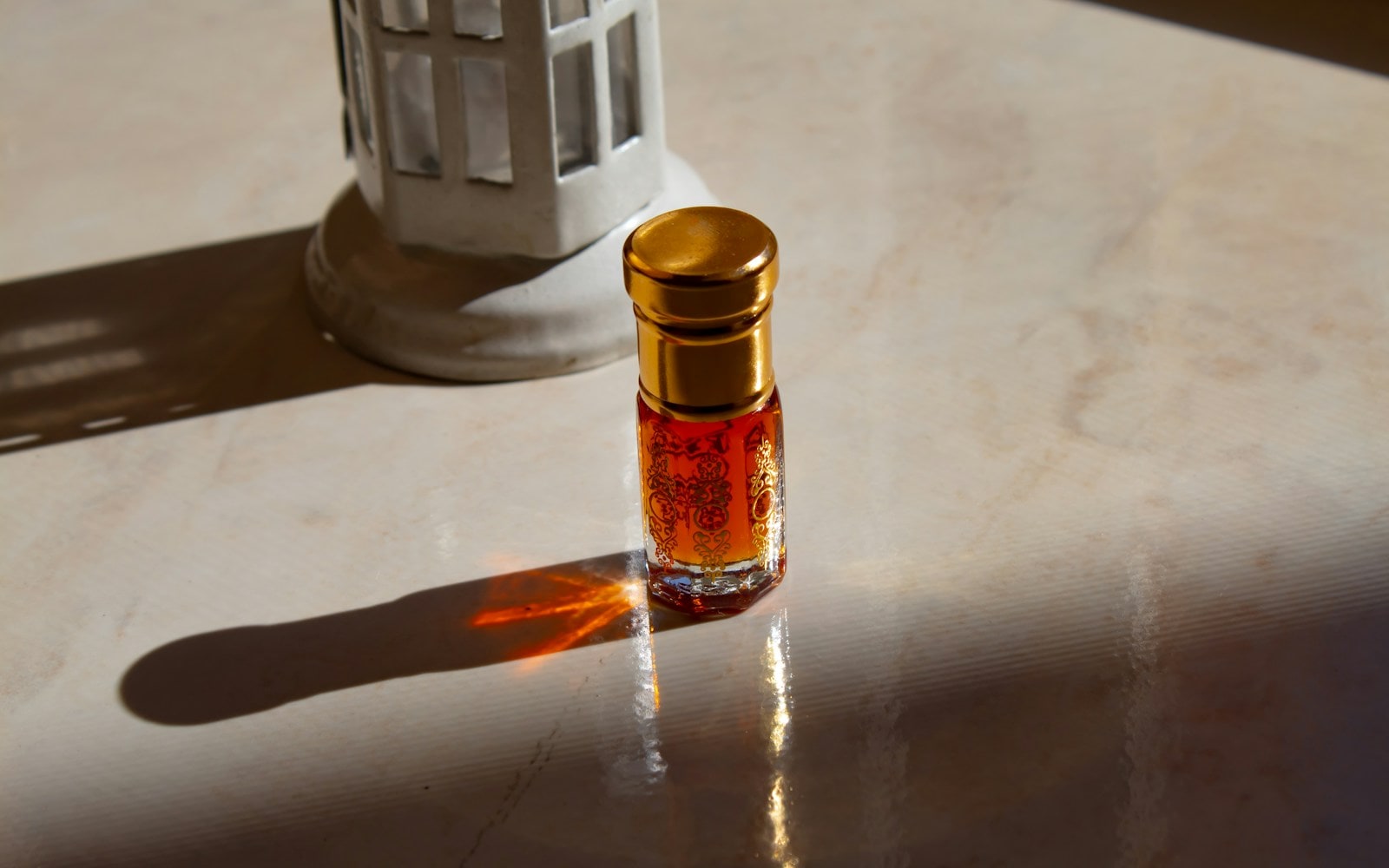 Attar application, representative licensed fragrance imagery